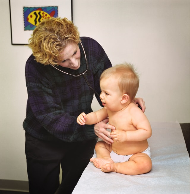 Paediatrician with young baby